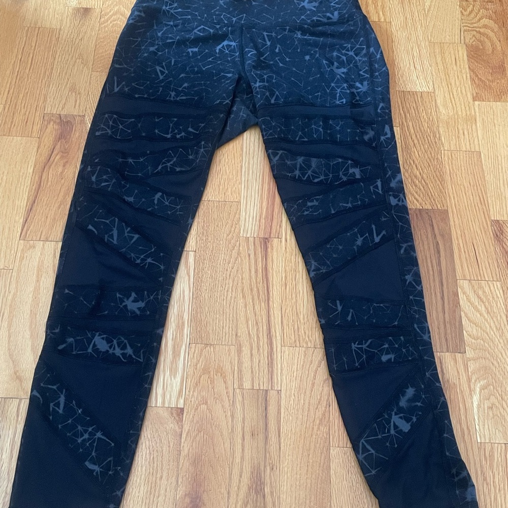Lululemon Black Leggings - Small hole in back of leg